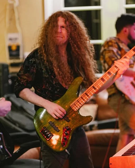 Bass being played during the session.